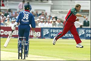 Vikram Solanki watches as Zimbabwe captain Heath Streak celebrates taking his wicket