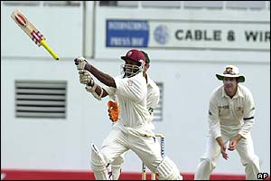 West Indies batsman Shivnarine Chanderpaul loses his bat after playing a shot