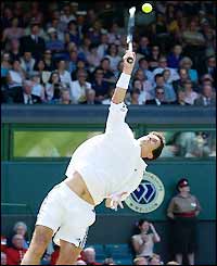 Tim Henman gets the match under way on Centre Court