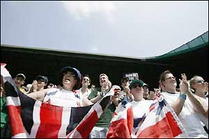 The crowd get behind home favourite Henman on Centre Court