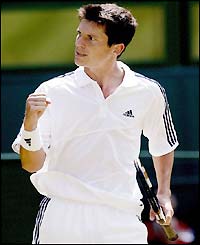 Henman celebrates as he goes 2-0 up
