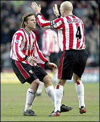 Anders Svensson is congratulated by Chris Marsden as Southampton beat Norwich