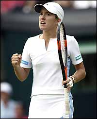 Henin-Hardenne celebrates her win over Flavia Pennetta 