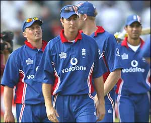England captain Michael Vaughan looks dejected as he leads his defeated England team off the field