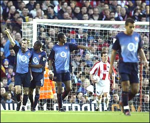 Francis Jeffers celebrates after scoring against Farnborough