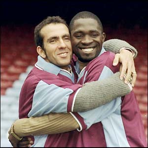 Mark-Vivien Foe poses with Paulo Di Canio after the pair where signed by Harry Redknapp