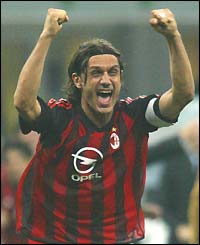 Paolo Maldini celebrates AC Milan reaching the final