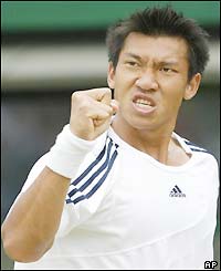 Thailand's Paradorn Srichapan celebrates his three-set win