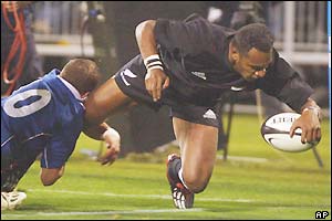 New Zealand wing Joe Rokocoko scores his side's third try in Christchurch