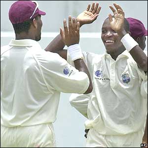 Fidel Edwards celebrates his first Test wicket with Corey Collymore
