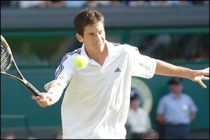 Tim Henman plays a forehand volley at Centre Court