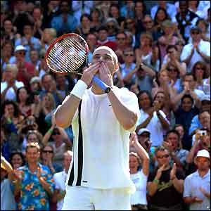 Agassi savours the applause of the crowd after beating El Aynaoui 