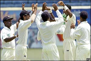 Sri Lanka's players celebrate the wicket of West Indies' Wavell Hinds