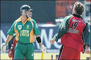 Zimbabwe's Andy Blignaut celebrates dismissing Herschelle Gibbs