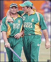 South Africa's Jacques Kallis and Greame Smith celebrate