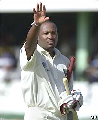 West Indian captain Brian Lara waves to the crowd after leading his side to victory