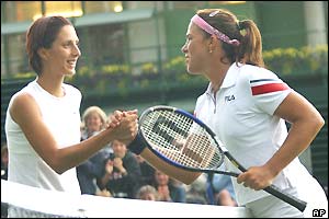 Anastasia Myskina shakes hands after losing to Jennifer Capriati