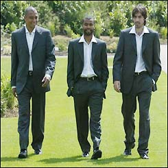 Gilberto Silva, Ashley Cole and Robert Pires show off Arsenal's 2003 FA Cup final suit
