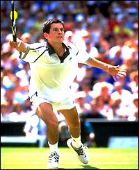 Tim Henman in action against Pete Sampras in the 1999 Wimbledon semi-finals