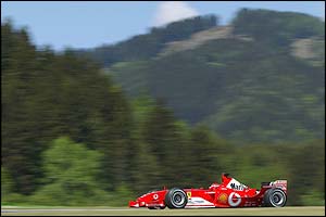 Michael Schumacher powers his Ferrari around the circuit