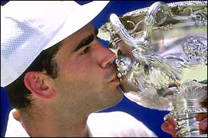 Pete Sampras embraces the Australian Open trophy