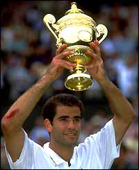 Pete Sampras raises the Wimbledon trophy in 1999
