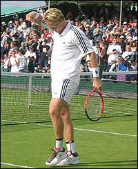 Jonas Bjorkman celebrates his victory over Max Mirnyi