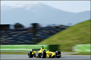 Firman takes to the track in his Jordan but can't match Schumacher