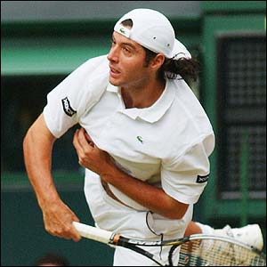 Sebastien Grosjean serves to Tim Henman