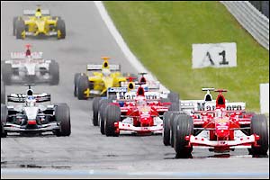 The drivers jostle for position behind Michael Schumacher
