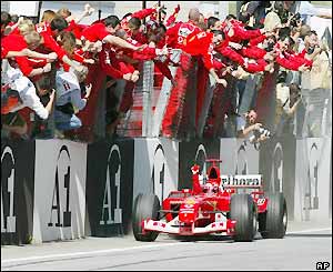 Schumacher takes the chequered flag to win the Austrian Grand Prix
