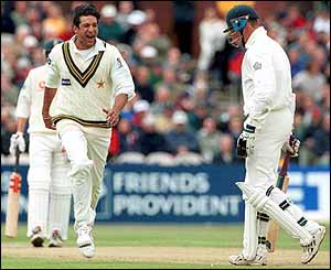 Wasim Akram celebrates taking the wicket of England opener Marcus Trescothick in 2001