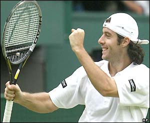 Sebatien Grosjean celebrates victory over Tim Henman