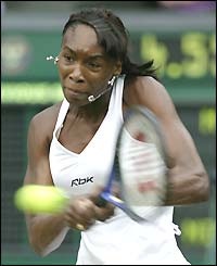 Venus Williams returns the ball