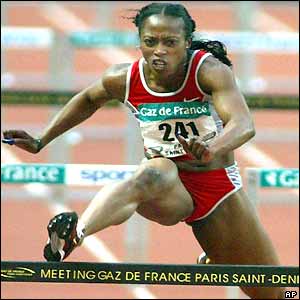 Gail Devers competes in the 100m hurdles