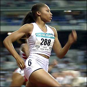 Allyson Felix competes in the 200m