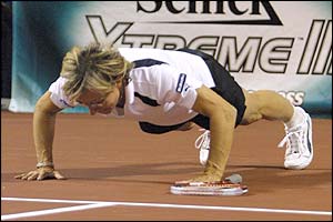 Martina Navratilova warms up before a match