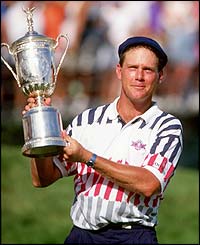 Payne Stewart holds the US Open trophy aloft after winning in 1992