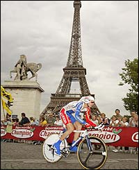 Great Britain's David Millar rides underneath the Eiffel Tower as the Tour de France begins