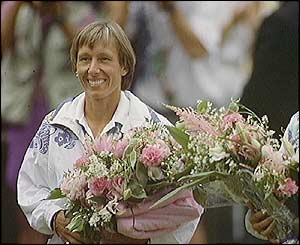 Navratilova holds a bunch of flowers at Wimbledon in 1994