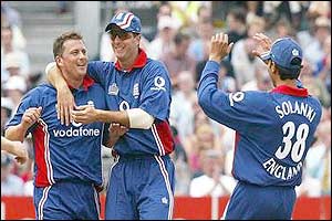 Darren Gough is congratulated for dismissing Grant Flower