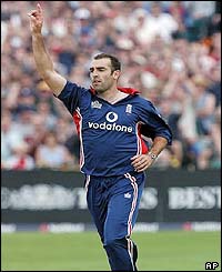 Richard Johnson celebrates the wicket of Tatenda Taibu for five