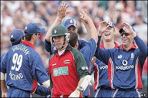 Heath Streak walks from the wicket after being dismissed for five