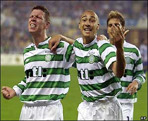 Larsson and Alan Thompson (left) celebrate the equalising goal