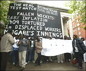 Anti-Mugabe protesters make their feelings known outside Lord's on the first day of the first Test