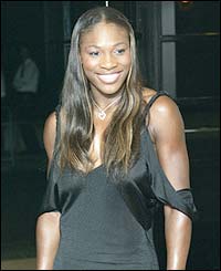 Serena Williams poses for photographers 