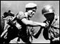 Cpl. Tony Gibbs of the 1st Middlesex Regiment (British Army) and Pte. Peter Mercbain of the United States 8th Army.