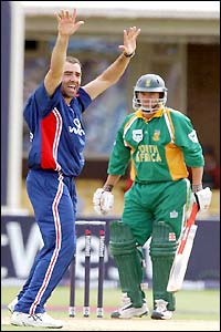 Johnson appeals for the wicket of Andrew Hall