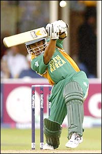 Paul Adams plays a lofted shot