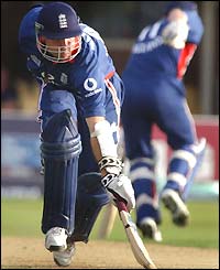 England captain Michael Vaughan grounds his bat after running a single